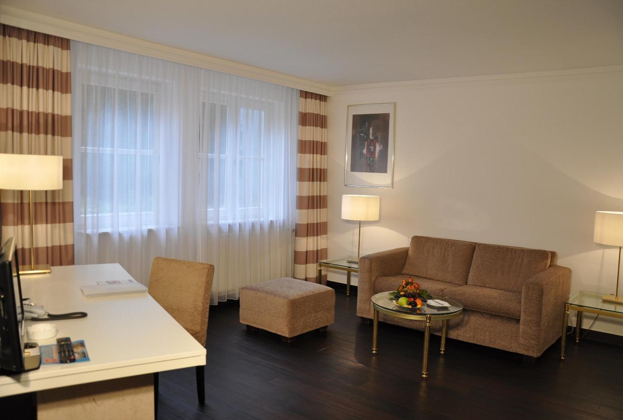Relexa Waldhotel Schatten Stuttgart Rum bild